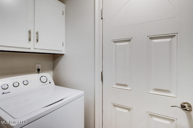 3109 Breezy Hill Ln, Ocean Springs, MS 39564 - clothes washing area with washer / clothes dryer and cabinet space