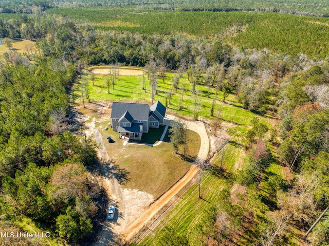 birds eye view of property featuring a rural view