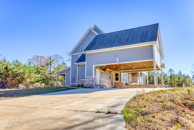 view of front of property with a carport