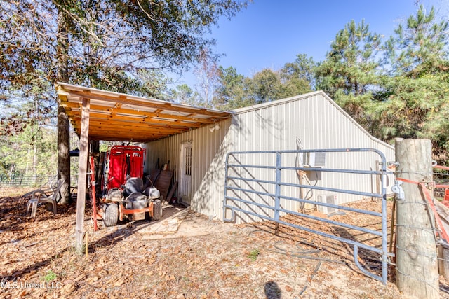 view of outdoor structure with a carport