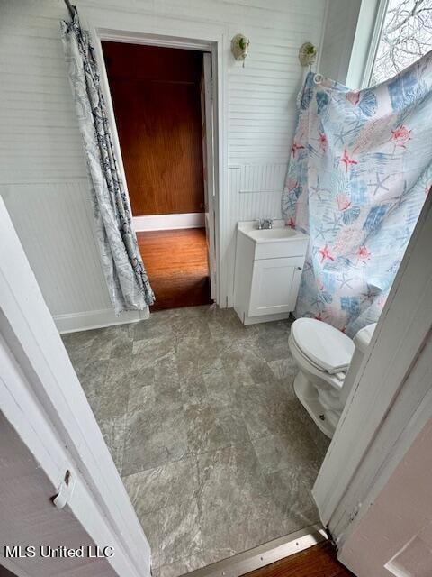 bathroom with vanity and toilet