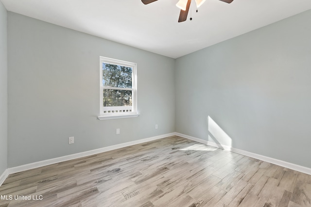 empty room featuring ceiling fan and light hardwood / wood-style floors