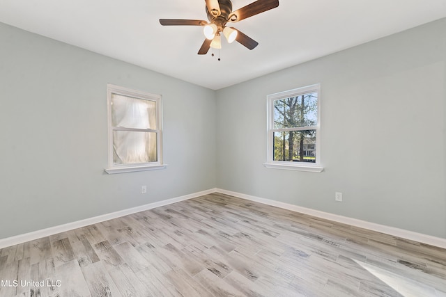 unfurnished room with ceiling fan and light hardwood / wood-style flooring