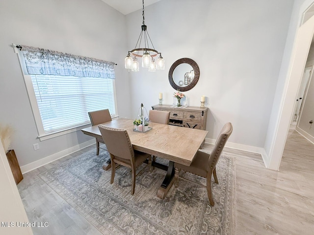 2290 Loisy Blvd, Hernando, MS 38632 - dining space featuring a chandelier, baseboards, and light wood-style flooring
