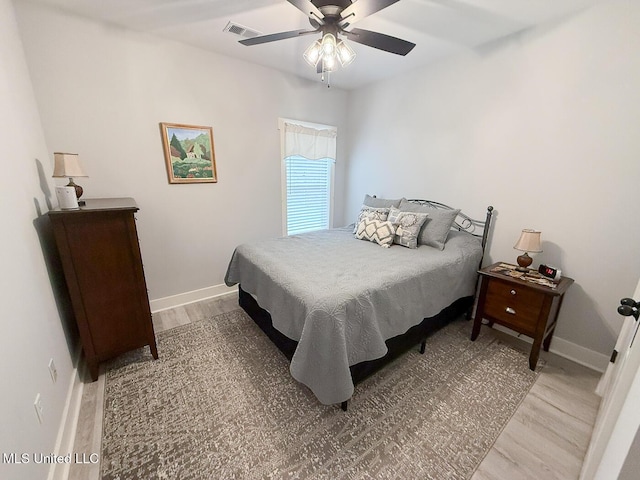 2290 Loisy Blvd, Hernando, MS 38632 - bedroom with light wood-type flooring, baseboards, and ceiling fan