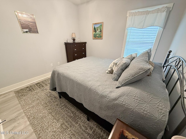 2290 Loisy Blvd, Hernando, MS 38632 - bedroom with wood finished floors and baseboards