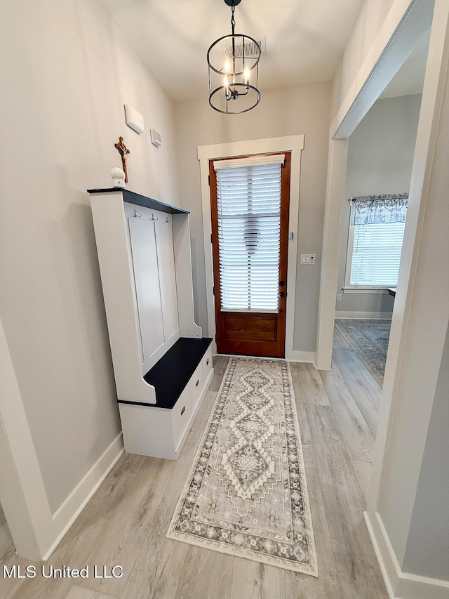 2290 Loisy Blvd, Hernando, MS 38632 - mudroom featuring light wood-style flooring, baseboards, and a chandelier