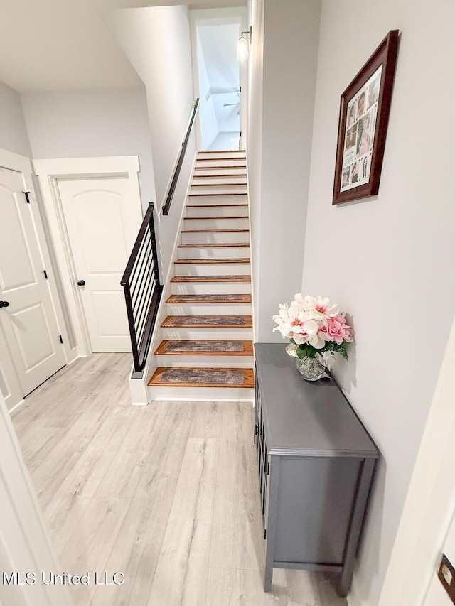 2290 Loisy Blvd, Hernando, MS 38632 - stairway featuring wood finished floors