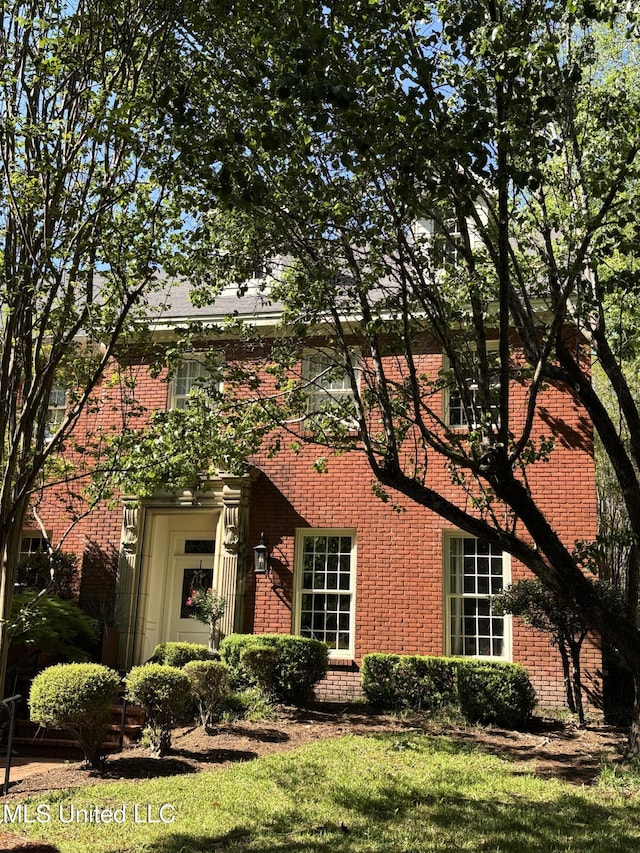 256 Eastbrooke St, Jackson, MS 39216 - view of front of home with brick siding and a front lawn
