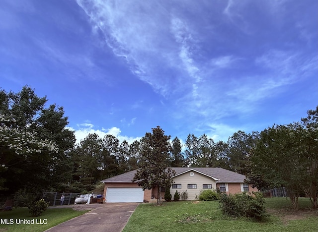 12 Minerva Rd, Kilmichael, MS 39747 - single story home with a garage, concrete driveway, and brick siding