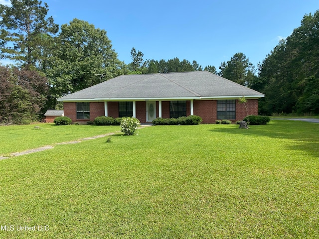 single story home with a front yard