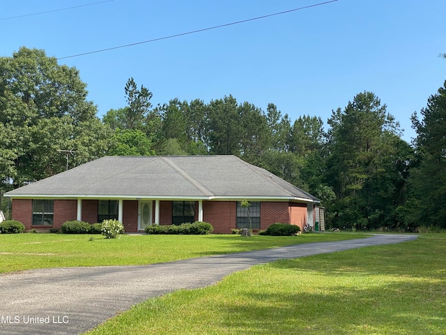 ranch-style house with a front yard