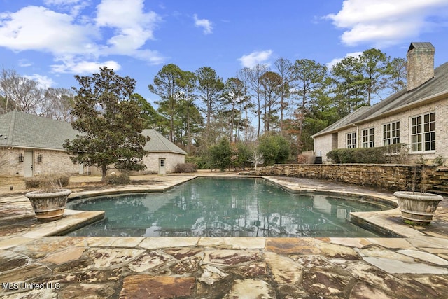 view of pool with a patio area