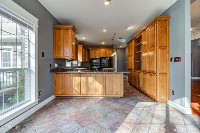 kitchen featuring a peninsula, a sink, black appliances, open shelves, and a wealth of natural light