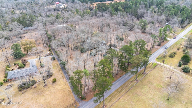 aerial view with a wooded view