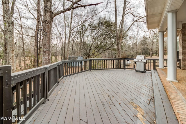 wooden deck with area for grilling