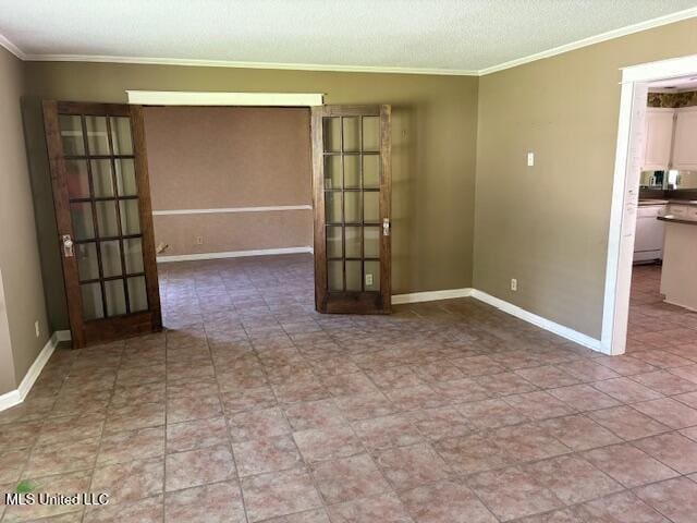 3 Pemberton Cir, Greenwood, MS 38930 - spare room with ornamental molding, baseboards, and a textured ceiling