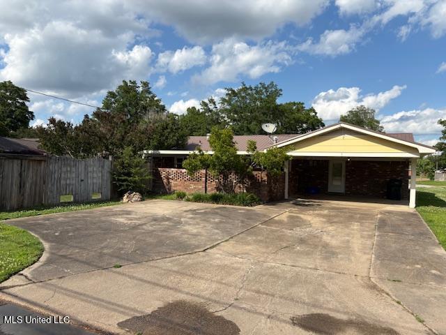 3 Pemberton Cir, Greenwood, MS 38930 - view of front of property featuring concrete driveway, fence, and brick siding