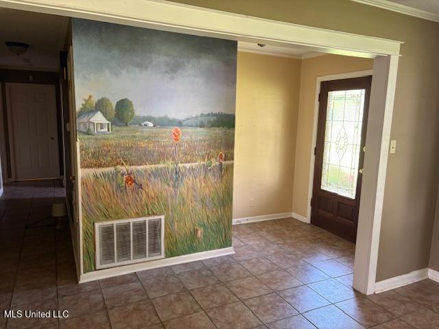 3 Pemberton Cir, Greenwood, MS 38930 - tiled entrance foyer with ornamental molding and baseboards