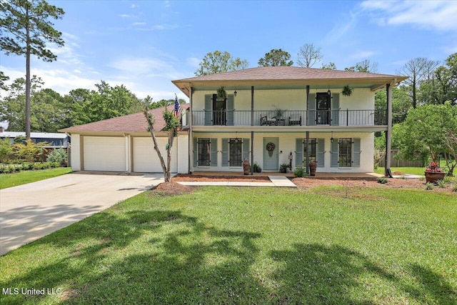 110 Stonington Ct, Brandon, MS 39047 - view of front of house featuring a balcony, concrete driveway, a garage, and a front yard
