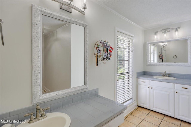 110 Stonington Ct, Brandon, MS 39047 - full bath with crown molding, vanity, a textured ceiling, and tile patterned floors