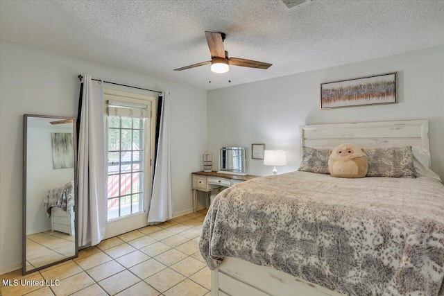 110 Stonington Ct, Brandon, MS 39047 - bedroom with light tile patterned floors, a textured ceiling, ceiling fan, and access to outside