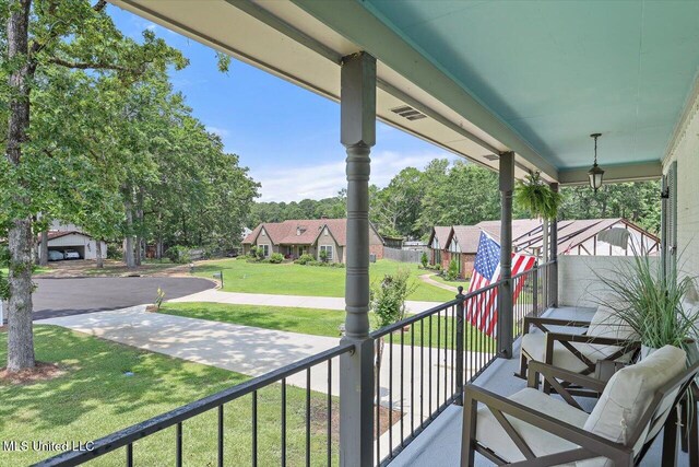 110 Stonington Ct, Brandon, MS 39047 - covered porch with a residential view