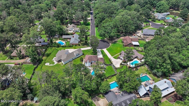 110 Stonington Ct, Brandon, MS 39047 - aerial overview of property's location with a pool area and nearby suburban area