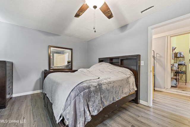 4006 Pine St, Pascagoula, MS 39567 - bedroom with wood finished floors and a ceiling fan