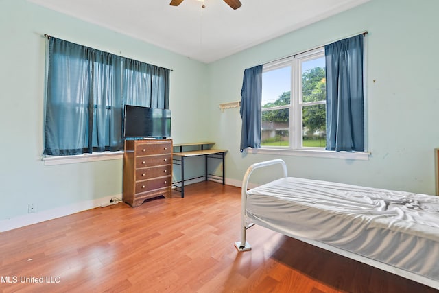 4006 Pine St, Pascagoula, MS 39567 - bedroom with wood finished floors and ceiling fan