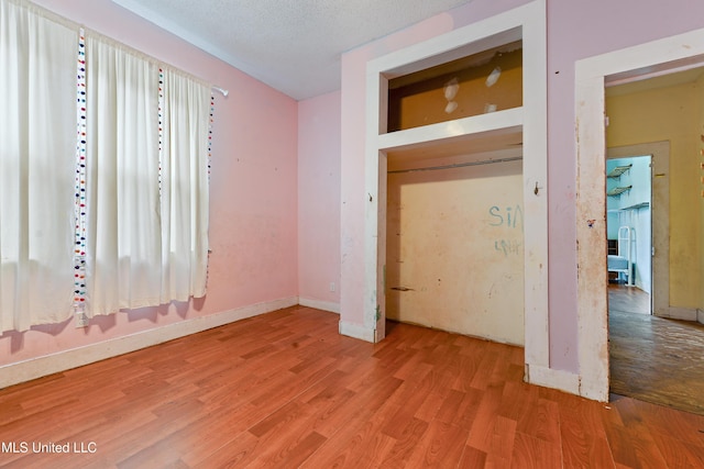 4006 Pine St, Pascagoula, MS 39567 - unfurnished bedroom with light wood-style flooring