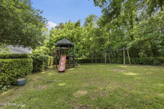 3831 Tyrone Dr, Jackson, MS 39216 - view of grassy yard with a playground