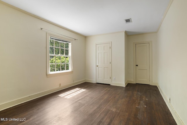 3831 Tyrone Dr, Jackson, MS 39216 - unfurnished room featuring dark wood-style flooring and ornamental molding