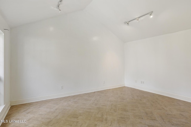 3831 Tyrone Dr, Jackson, MS 39216 - unfurnished room with track lighting and lofted ceiling