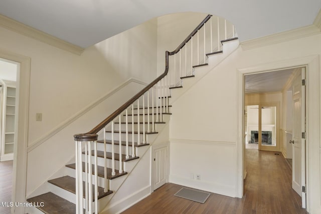 3831 Tyrone Dr, Jackson, MS 39216 - staircase featuring wood finished floors and ornamental molding