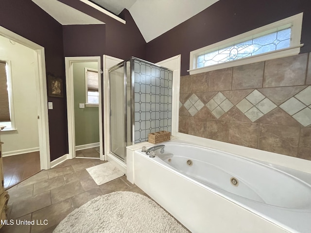 5269 Blocker St, Olive Branch, MS 38654 - full bath featuring a shower stall, a whirlpool tub, and lofted ceiling