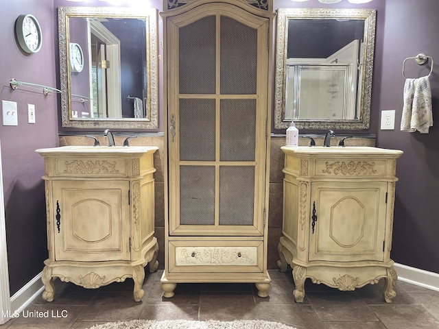 5269 Blocker St, Olive Branch, MS 38654 - bathroom with two vanities and a shower stall