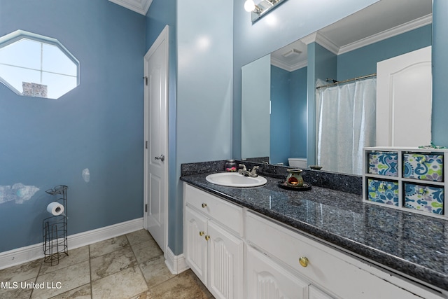 bathroom with vanity and crown molding