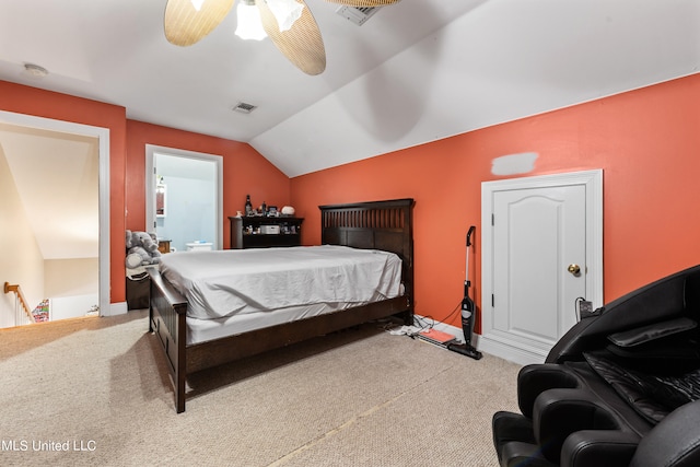 bedroom featuring lofted ceiling, carpet, and ceiling fan