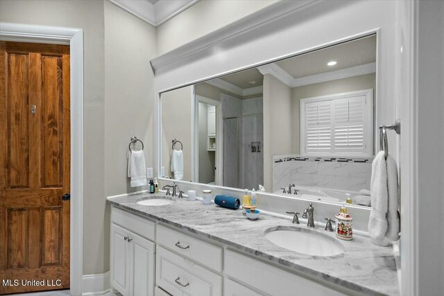 bathroom featuring vanity, separate shower and tub, and crown molding