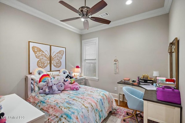 bedroom with ceiling fan and crown molding