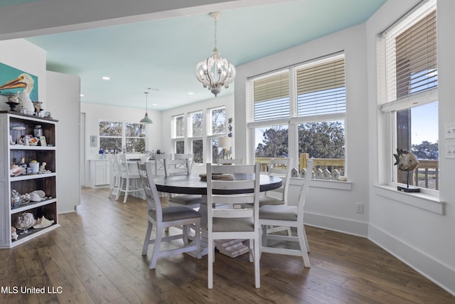 dining room featuring recessed lighting, baseboards, dark wood-style flooring, and a chandelier