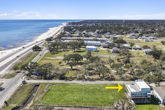 bird's eye view with a view of the beach and a water view