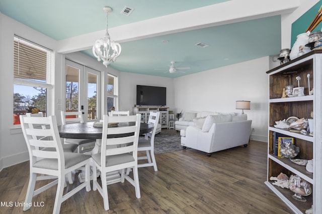 dining area featuring french doors, baseboards, dark wood finished floors, and ceiling fan with notable chandelier