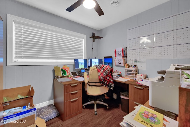 office with wood-type flooring and ceiling fan