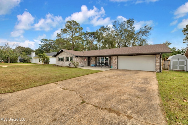 ranch-style home featuring a front yard and a garage