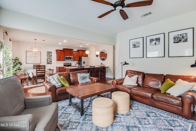 living room with recessed lighting, visible vents, and ceiling fan