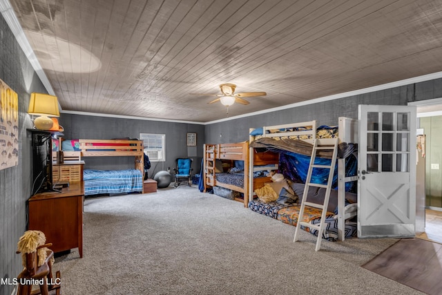 carpeted bedroom with crown molding, a ceiling fan, and wooden ceiling