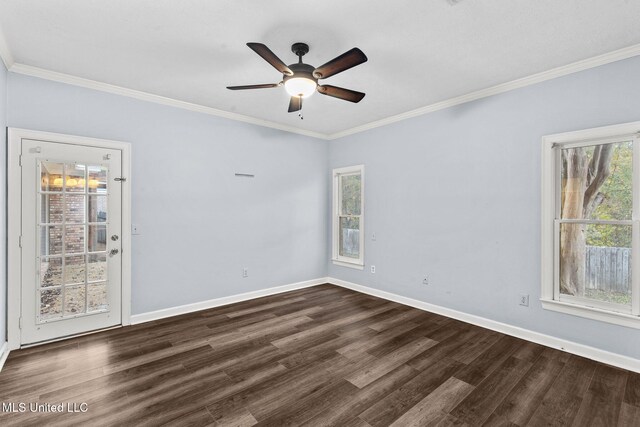 spare room featuring ceiling fan, dark hardwood / wood-style floors, and ornamental molding