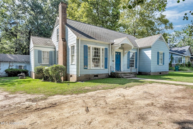 view of front facade with a front yard